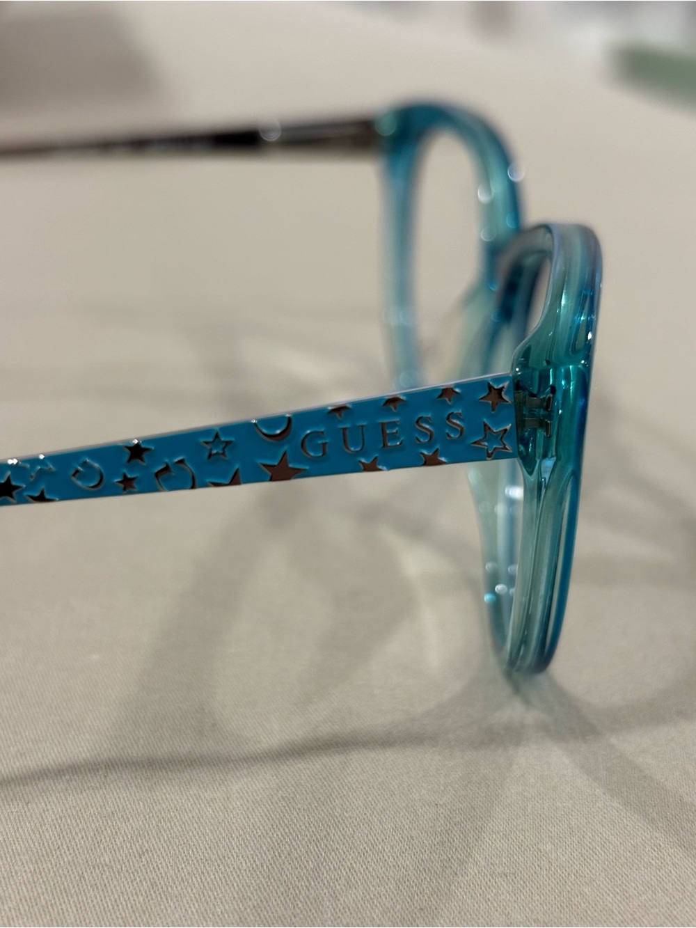 GUESS Teal Glasses with Star Accent Temples